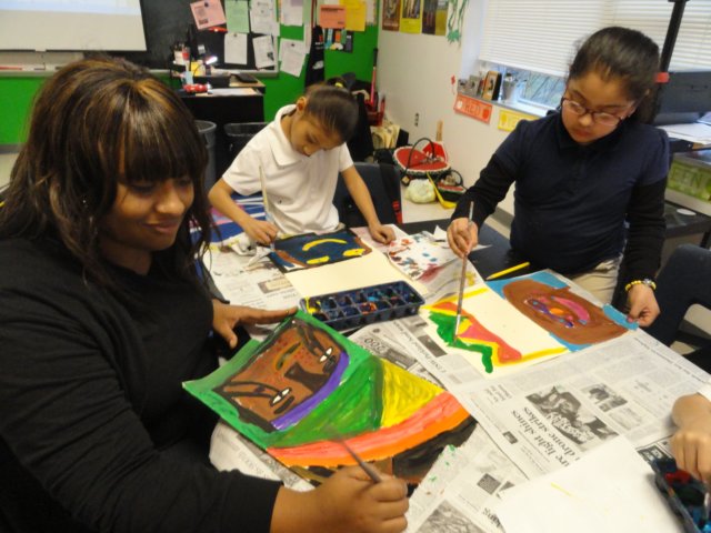 parentpaintingandsharingherculturalheritagewithstudent.jpg