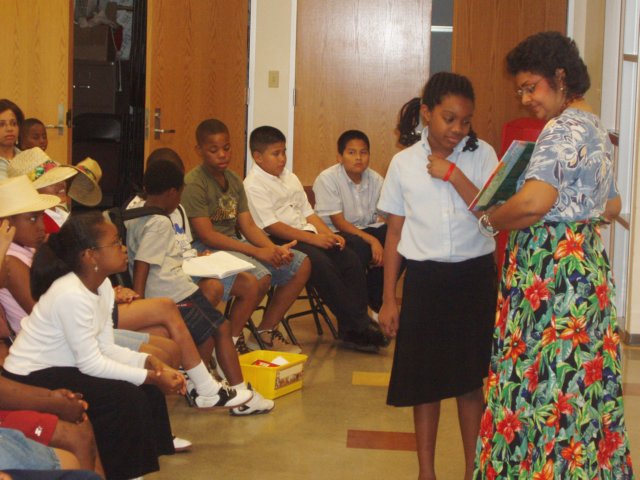 thechildrenreadingtotheaudience.jpg